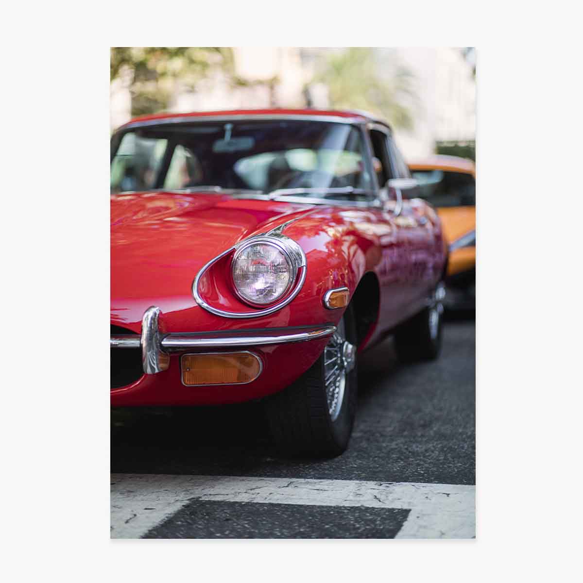Póster de un coche rojo vintage